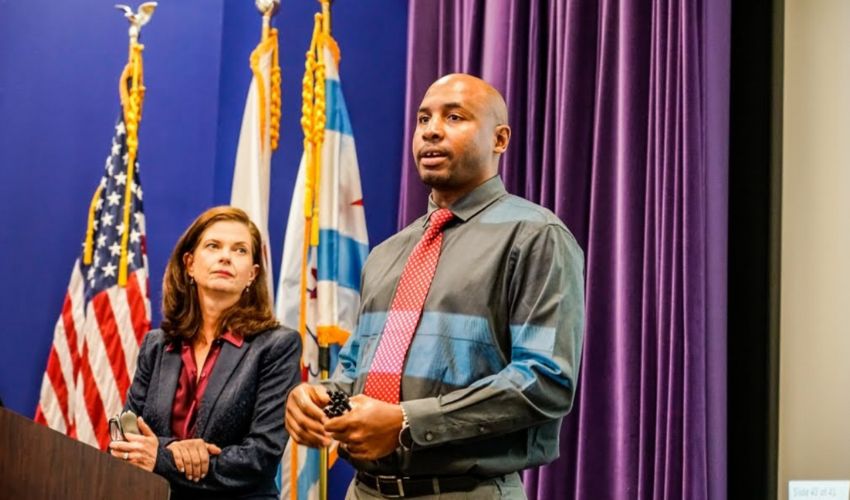 Marshan Allen speaking beside Illinois Appellate Court Justice Eileen O’Neill Burke