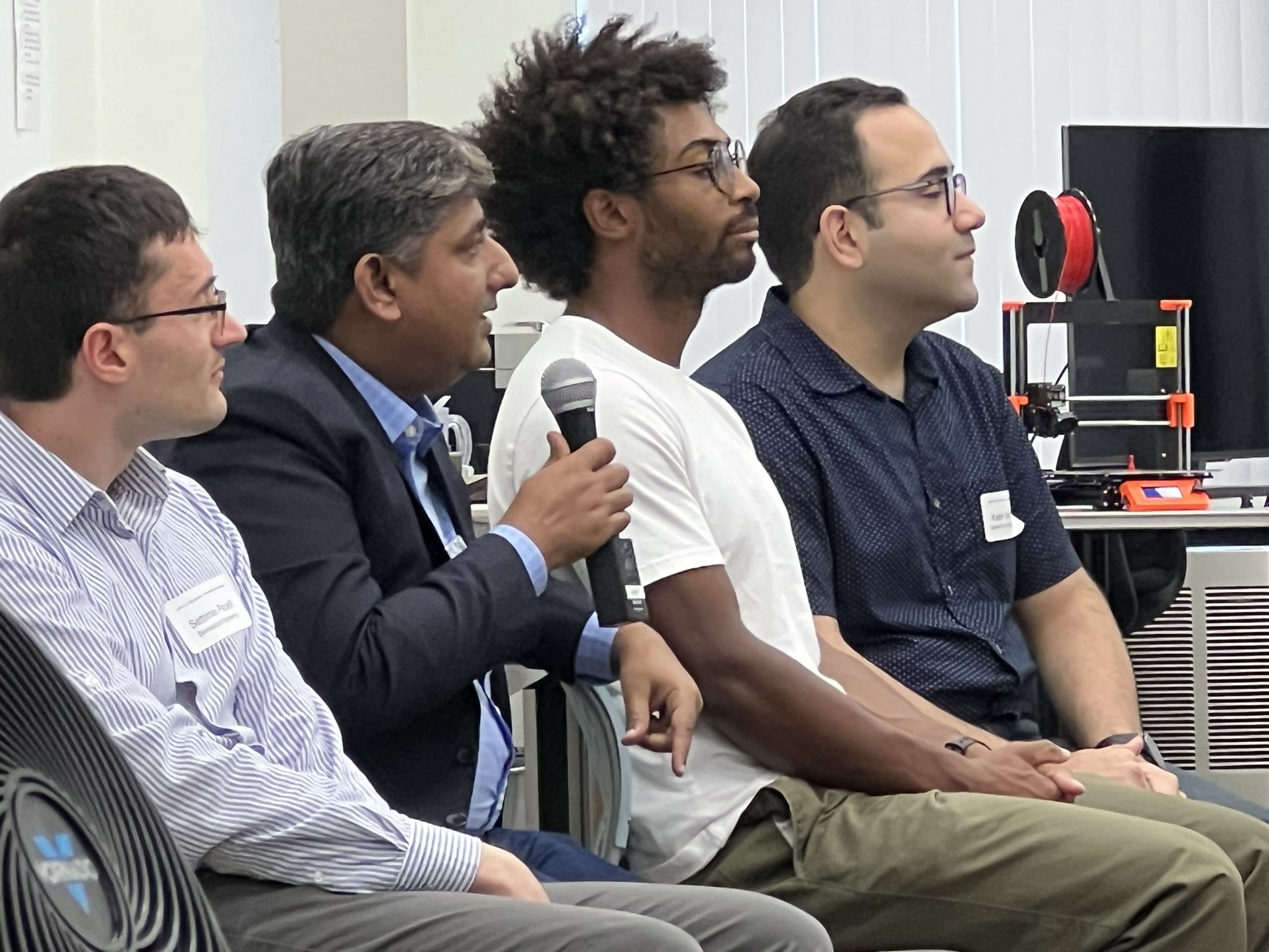 Muhammad Khan speaks during a panel discussion
