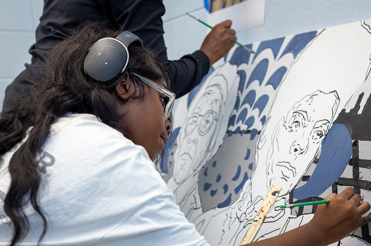 A Dunbar Vocational Career Academy student paints during an Illinois Tech summer program