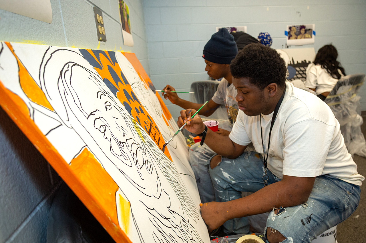 A Dunbar Vocational Career Academy student paints during an Illinois Tech summer program