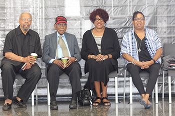 Images from the Mecca Flats press conference