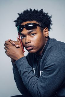 Headshot of Zion Ali, featured musician of the Wildflower Music Festival