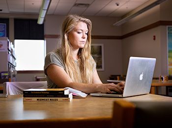 Technology and Humanities student Monika Sziron works on her laptop