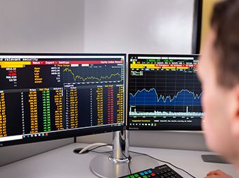 An Illinois Tech student works in Stuart School of Business’ Financial Research Lab