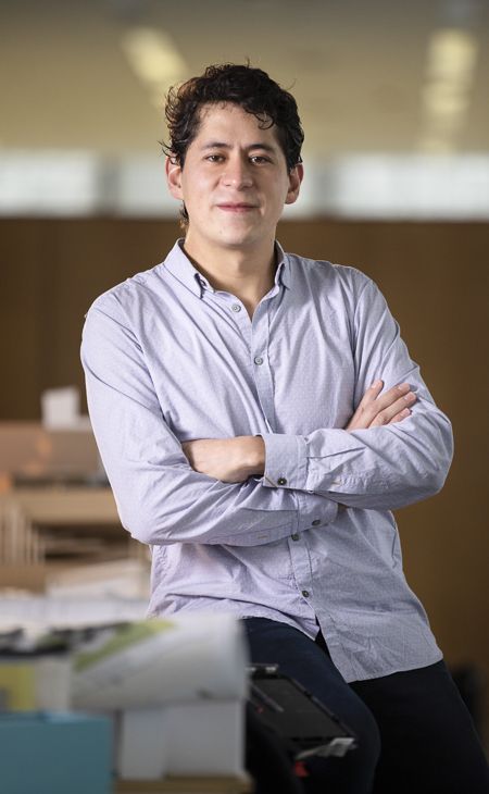 Alexis Arias poses in Crown Hall