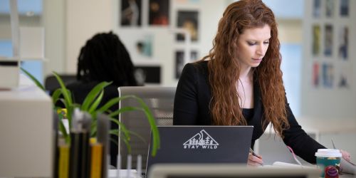 An Illinois Tech student works at the Kaplan Institute